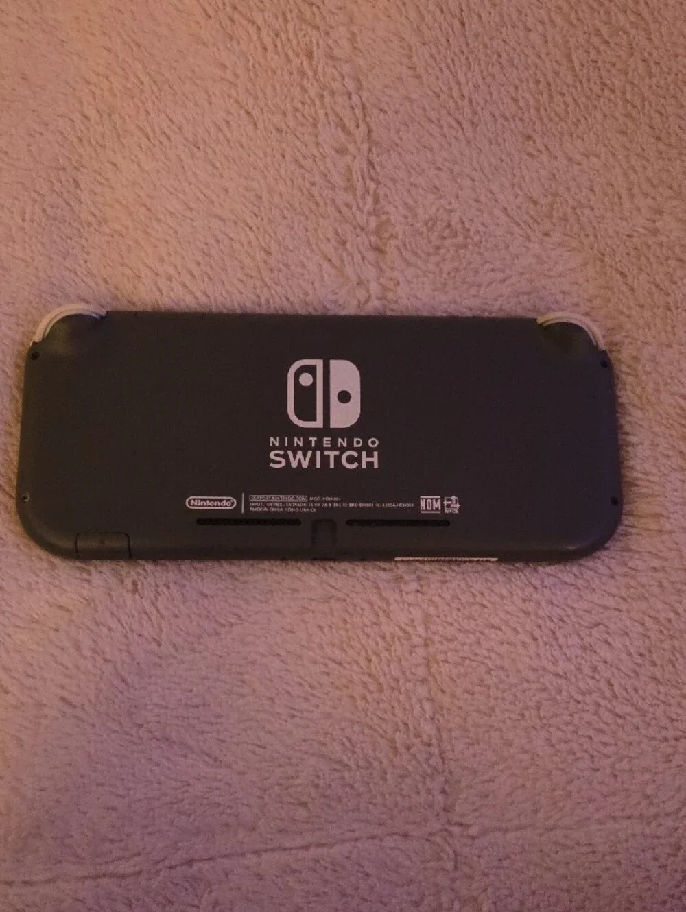 Nintendo Handheld Gaming Console in Black and White